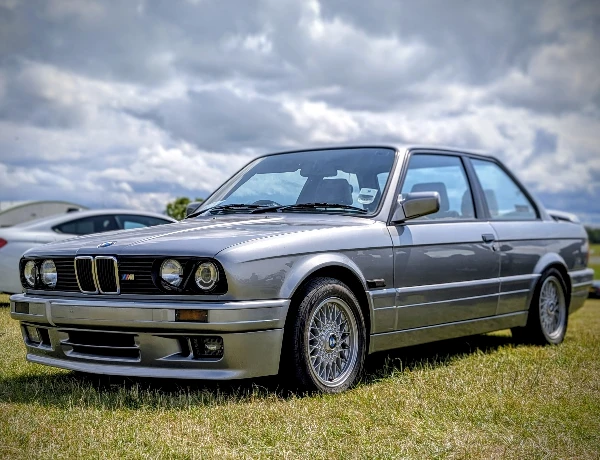 Grey BMW M3 E30 at M60 Modified Friday night car meet, Barton Aerodrome